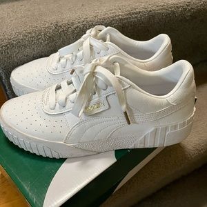 Women’s white Puma’s